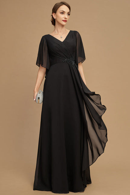 Robe Noire Luxe Satinée À Manches.
