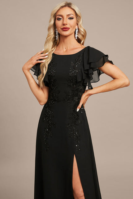 Robe Noire Luxe À Manches Bouffantes - gallery 1