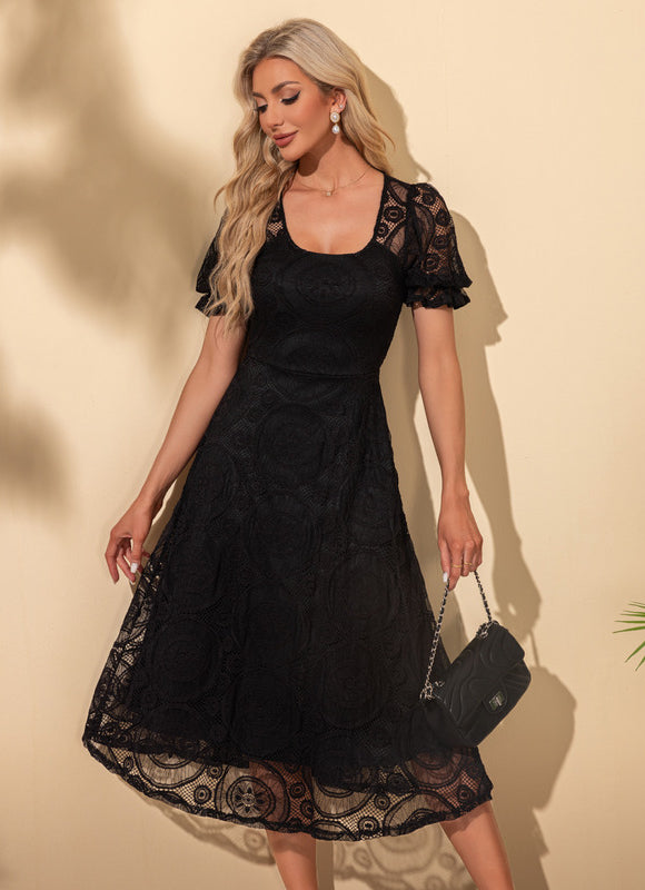 Robe Noire Chic À Manches Bouffantes - gallery 3