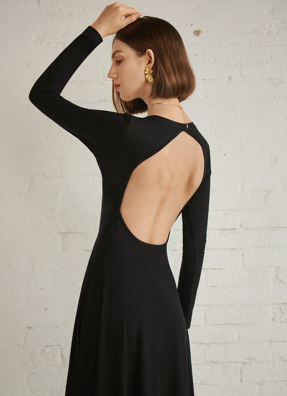 Robe Noire Chic À Boutons Élégants - gallery 1