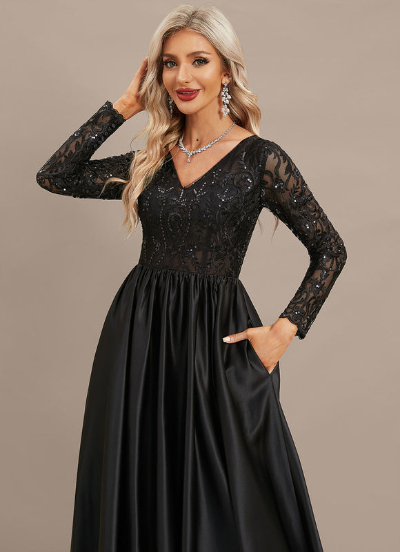 Robe Noire Luxe Satinée Élégante - gallery 1