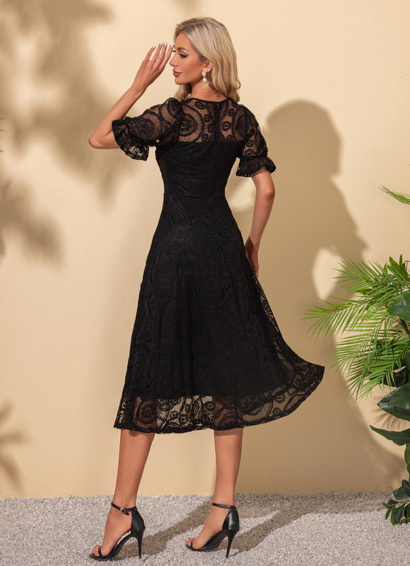Robe Noire Chic À Manches Bouffantes - gallery 1